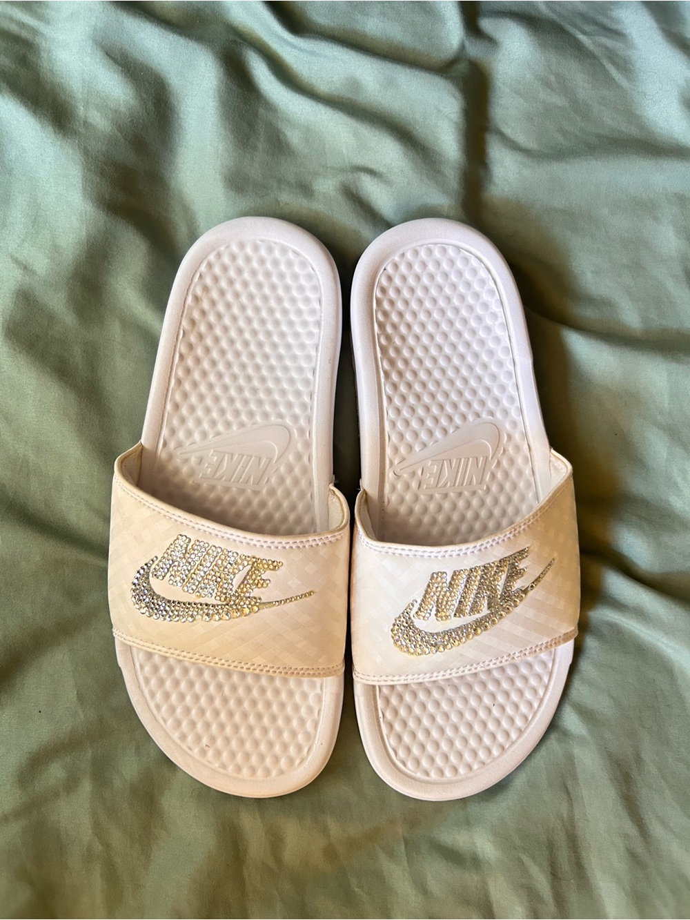 Nike Women's White Slides with Gold Crystal Logo